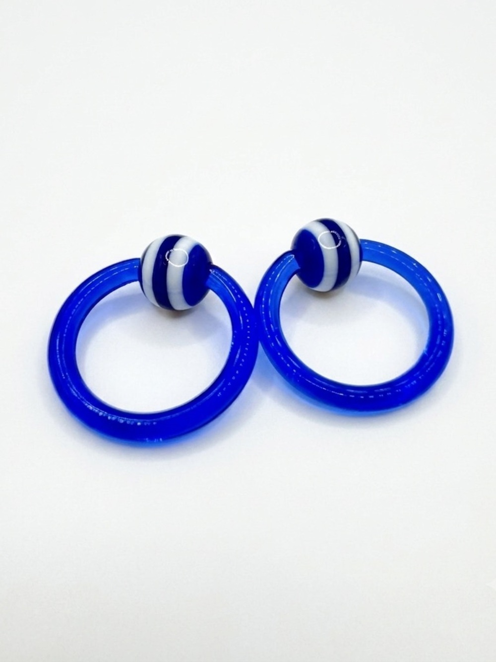 12g 7/16 Captive Bead Ring Pr Blue w/ Blue & White Striped Beads